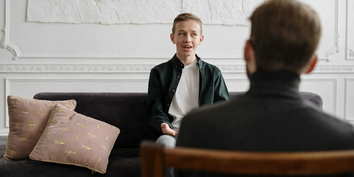 young person talking to therapist 